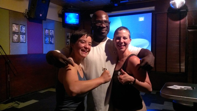 With storytellers Carmen and James. Carmen with trophy from the Dollar Store for Best Story of the Night.