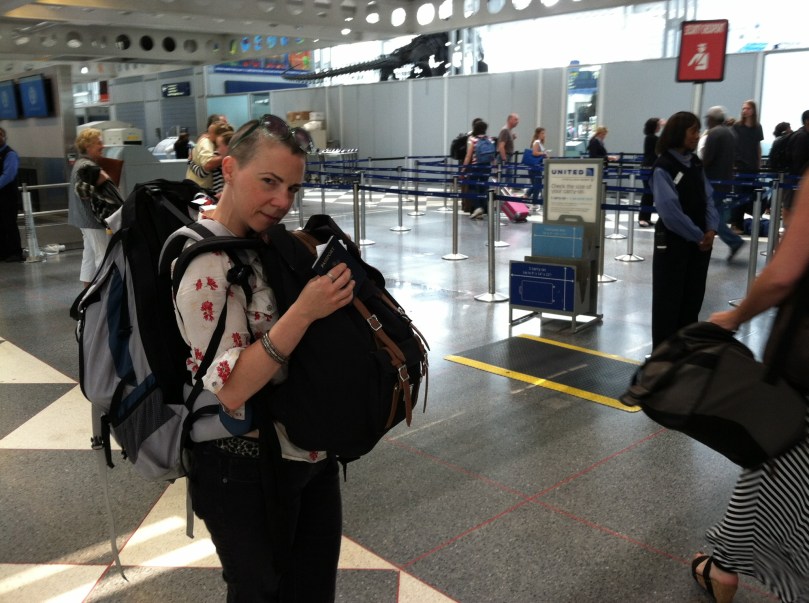 With heavy bags and a heavy heart, saying goodbye at the airport.